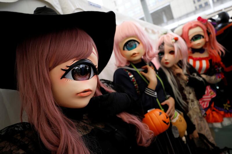 Participants in costumes wait for a Halloween parade in Kawasaki, south of Tokyo, Japan. Reuters