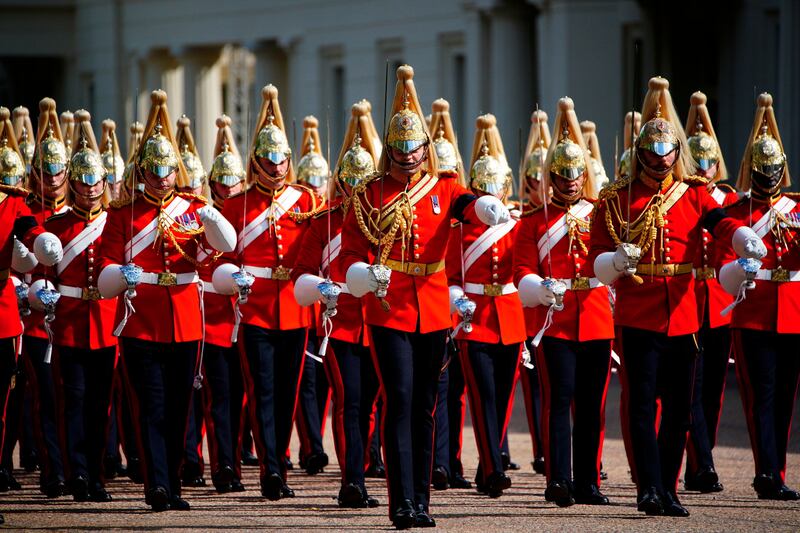 Members of the Life Guards leave Wellington Barracks ahead of the procession. AP