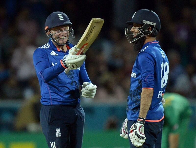 England's Jonny Bairstow, left, celebrates reaching his 50 during the fourth one-day international match against Pakistan at Headingley on September 1, 2016. England wont he match by four wickets. Oli Scarff / AFP