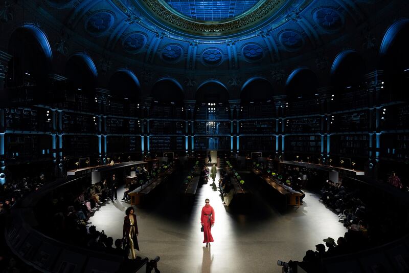 Models show off Kenzo's ready-to-wear autumn-winter 2024/25 collection during Paris Men's Fashion Week. AP Photo