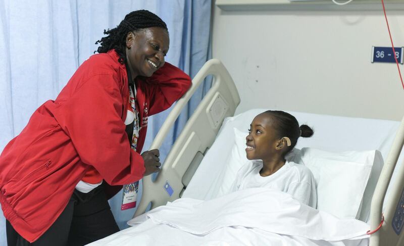 Abu Dhabi, United Arab Emirates - Shanice Bapiste, from Trinidad and Tobago, a Special Olympics Athlete for Bocce sport with her coach Clevanic Williams-Cupid at Sheikh Khalifa Medical Centre. Khushnum Bhandari for The National
