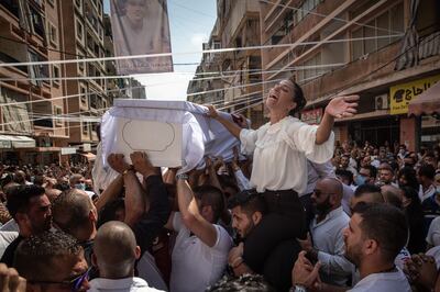 The sister of Ralf Malahi during his funeral in Beirut. Getty