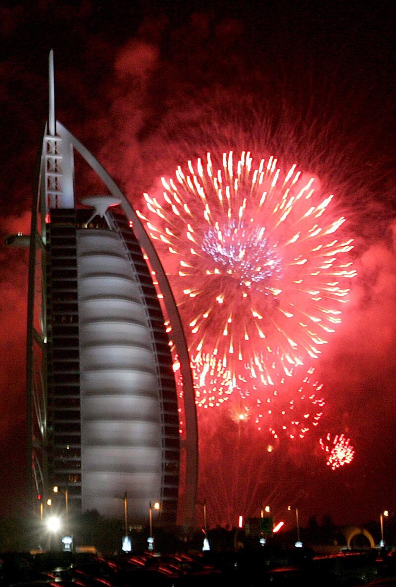DUBAI, UNITED ARAB EMIRATES – January 1: Fireworks display near the Burj Al Arab hotel on January 1, 2008 to welcome the New Year in Dubai. (Photo by Pawan Singh /Abu Dhabi Media Company)