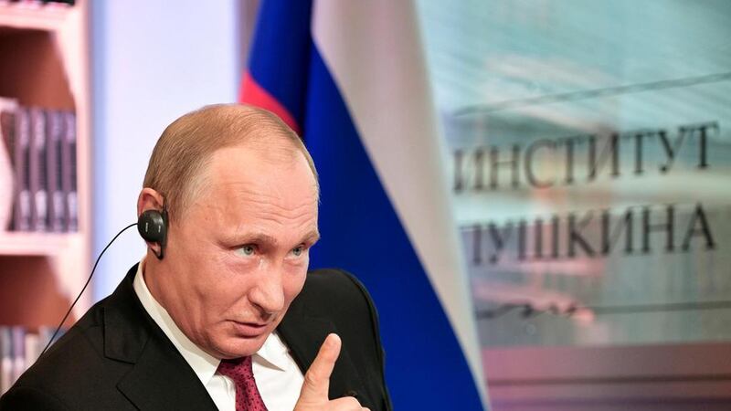 Russian President Vladimir Putin discussed the civil war in Syria with US President Donald Trump and several Middle Eastern leaders on Tuesday. Sputnik, Kremlin pool photo via AP