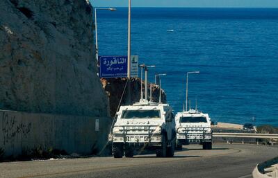 United Nations peacekeeping force (UNIFIL) vehicles patrol the area of Naqura, south of the Lebanese city of Tyre, on the border with Israel, on October 2, 2020. Lebanon and Israel said they will hold US-brokered negotiations on their disputed maritime border, in what Washington hailed as a "historic" agreement between two sides technically still at war. The issue of the sea frontier is particularly sensitive, as Lebanon wants to drill for hydrocarbons in a part of the Mediterranean disputed by Israel.
 / AFP / Mahmoud ZAYYAT
