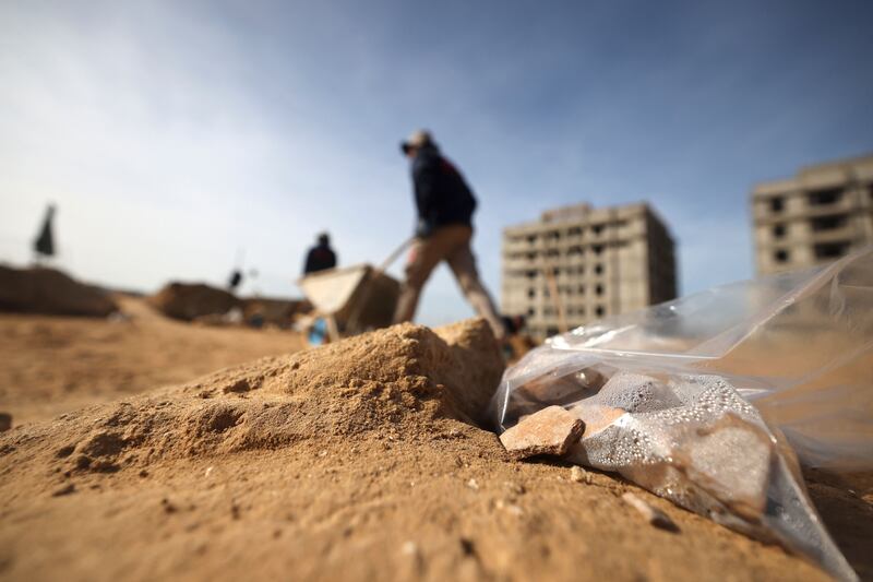 A set of bones and artefacts from one tomb were dated back to the second century, Hamas said. AFP