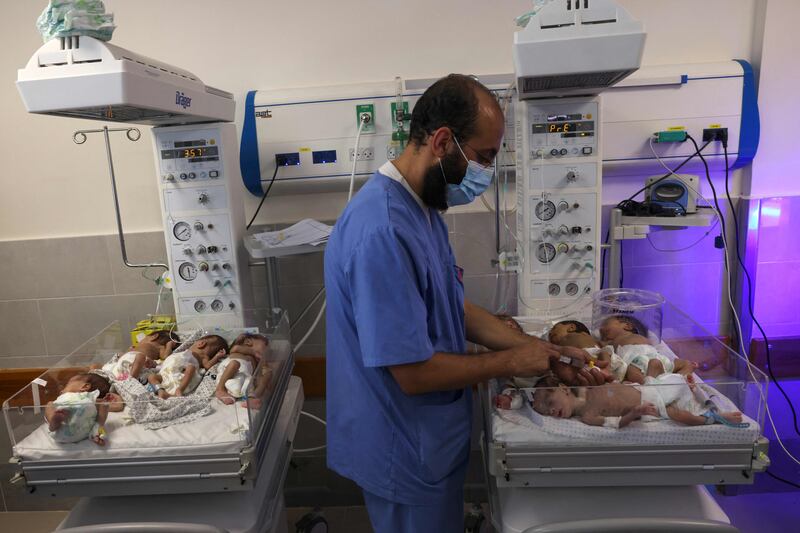 A Palestinian medic cares for premature babies amid the continued bombardment of Gaza from Israel. AFP