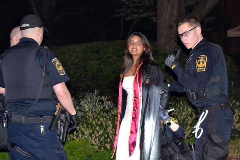 A student is arrested at a protest encampment on the Virginia Tech campus in Blacksburg. AP