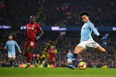 MANCHESTER, ENGLAND - JANUARY 03: Leroy Sane of Manchester City scores his team's second goal during the Premier League match between Manchester City and Liverpool FC at the Etihad Stadium on January 3, 2019 in Manchester, United Kingdom. (Photo by Shaun Botterill/Getty Images)