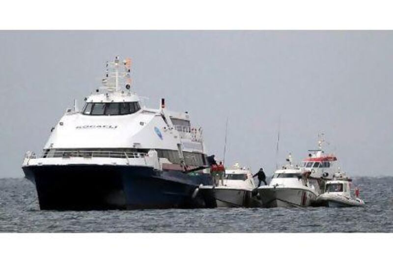 Turkish security forces release people from the hijacked ferry Saturday.