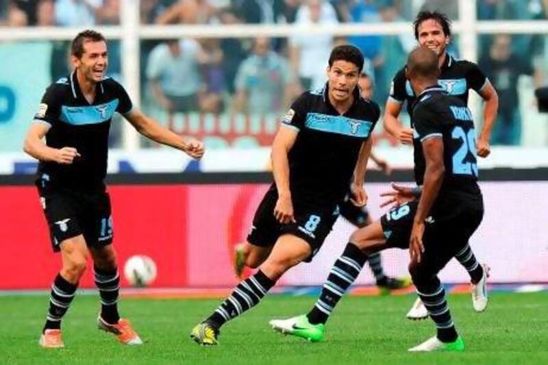 Lazio's Hernanes, centre, scored his fourth goal of the Serie A campaign against Pescara. Ettore Ferrari / EPA