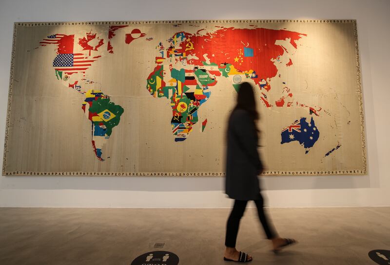 Large-scale works of art displayed during a major auction at Sotheby's Dubai gallery in September. Experts say the golden visa will attract artists from across the world to live and work in the UAE and can tap into a thriving community that appreciates art. EPA 