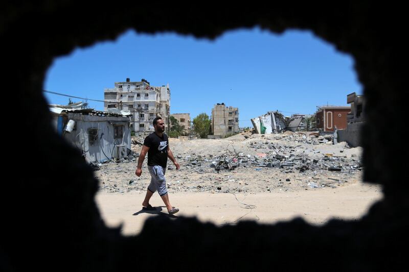 Ibrahim Dwedar helped to rescue Mr Shahin's horses after an Israeli air strike on Gaza. Reuters