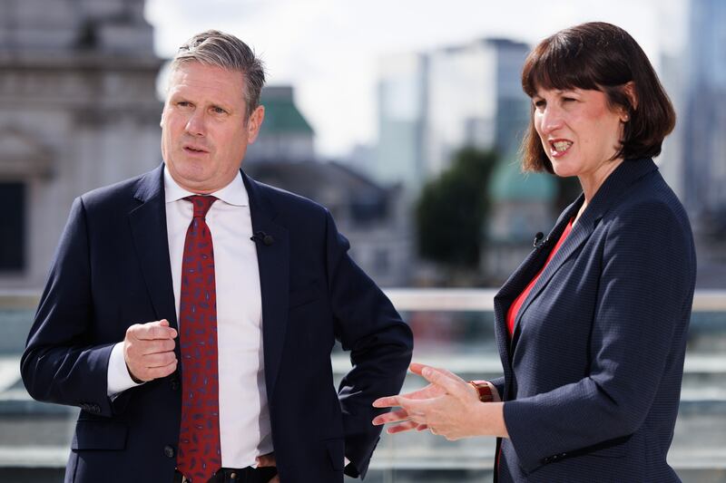 Labour leader Keir Starmer and Shadow Chancellor Rachel Reeves speak to the media on a visit to the London Stock Exchange. Getty Images