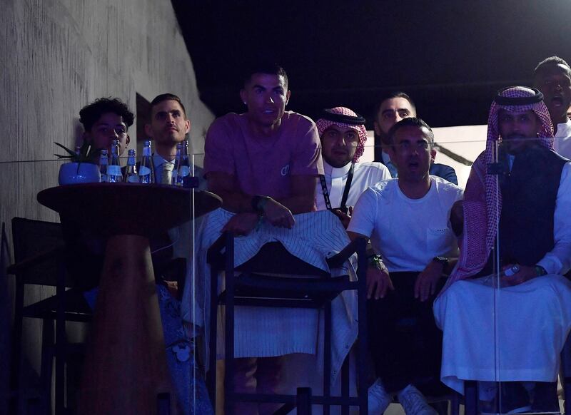 Al Nassr and Portugal striker Cristiano Ronaldo attends the boxing match between Tommy Fury and Jake Paul at Diriyah Arena, Saudi Arabia, February 27, 2023. Reuters