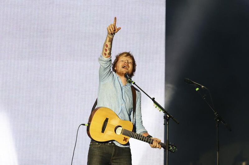 English singer-songerwriter Ed Sheeran performs to fans at Dubai Media City Amphitheatre in Dubai on March 5, 2015. Sarah Dea / The National