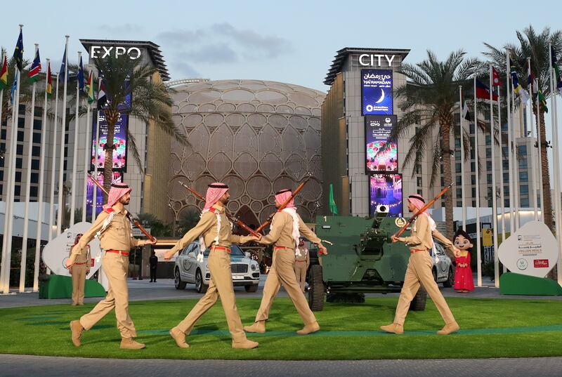 Officers prepare to fire a cannon at Expo City Dubai. Chris Whiteoak / The National