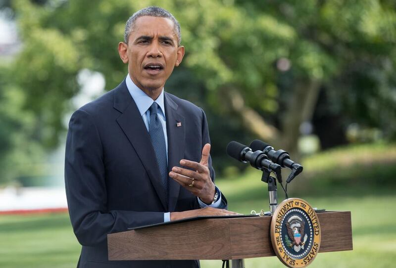 US President Barack Obama makes a statement on the situation in Ukraine on the South Lawn of the White House in Washington on July 29, 2014.   AFP PHOTO/Nicholas KAMM