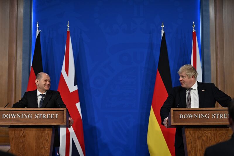 Britain's Prime Minister Boris Johnson at a joint press conference with Mr Scholz in the Downing Street briefing room in London in April. Getty Images