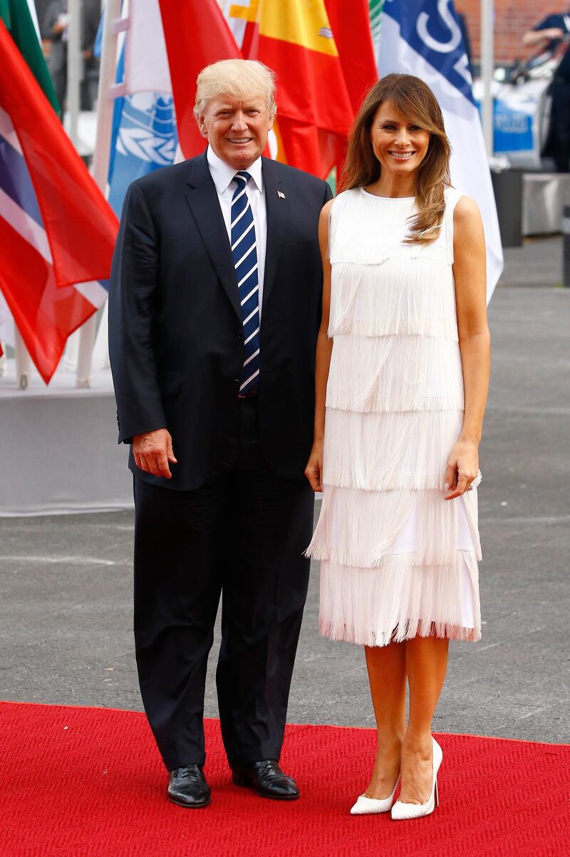 HAMBURG, GERMANY - JULY 07: US President Donald Trump and his wife Melania Trump arrive to attend a concert at the Elbphilharmonie philharmonic concert hall on the first day of the G20 economic summit on July 7, 2017 in Hamburg, Germany. The G20 group of nations are meeting July 7-8 and major topics will include climate change and migration. (Photo by Morris MacMatzen/Getty Images)