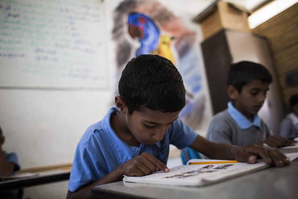 Pupils take part in a classroom activity at a Palestinian Bedouin of Jahaline tribe school in the area of E1, not far from the settlement of Maale Adumim in Wadi Abu Hindi, West Bank. All photos by Ilia Yefimovich / Getty Images