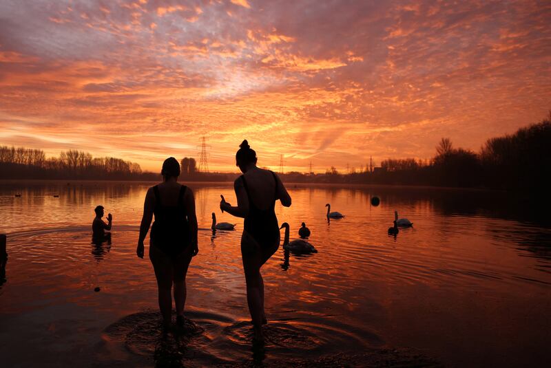 Swimmers braved the cold at Sale Water Park, Manchester, on Tuesday morning. Reuters