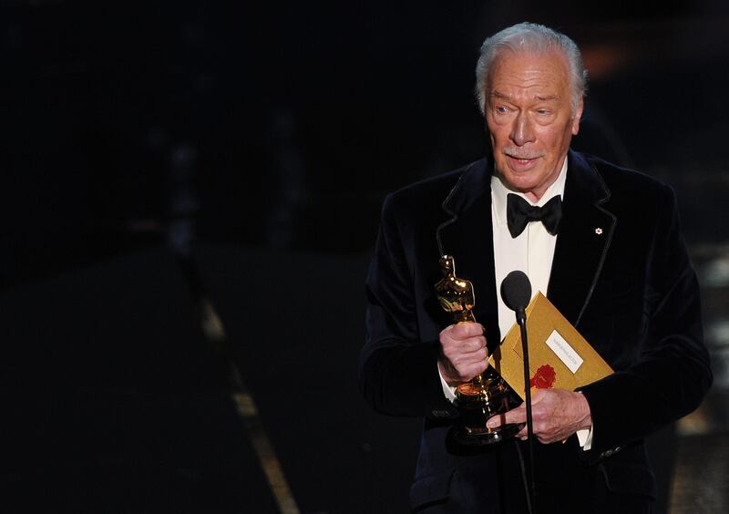 Actor Christopher Plummer holds the trophy for Best Supporting Actor onstage at the 84th Annual Academy Awards on February 26, 2012 in Hollywood, California. AFP PHOTO Robyn BECK
