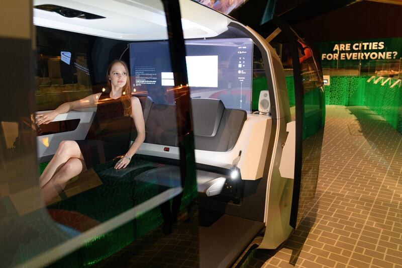 LONDON, ENGLAND - MAY 09:  A gallery assistant sits inside the "Sedric" Volkswagen driverless concept car during the press launch of the new exhibition; "The Future Starts Here" at Victoria and Albert Museum on May 9, 2018 in London, England.  Running from May 12 to November 4 2018, the exhibition brings together ground-breaking technologies and designs currently in development around the world.  (Photo by Leon Neal/Getty Images)