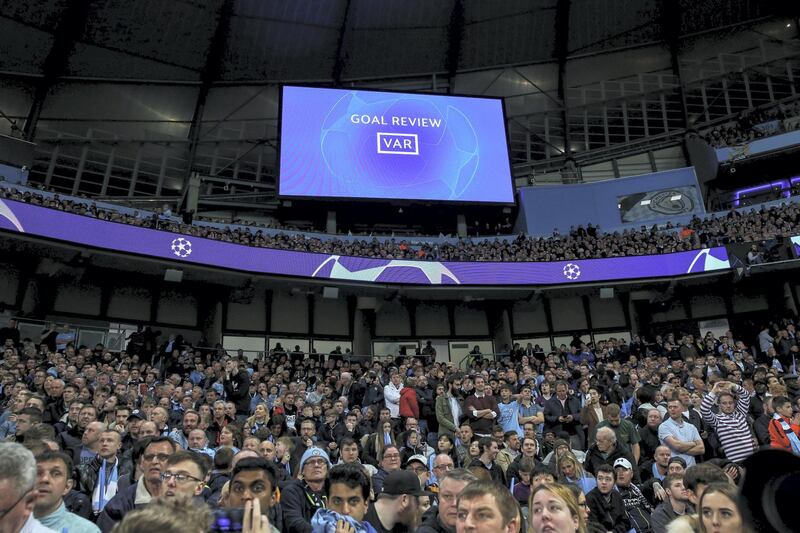 MANCHESTER, ENGLAND - APRIL 17:  Fans of Manchester City look on as a VAR decision is made during the UEFA Champions League Quarter Final second leg match between Manchester City and Tottenham Hotspur at at Etihad Stadium on April 17, 2019 in Manchester, England. (Photo by Robbie Jay Barratt - AMA/Getty Images)