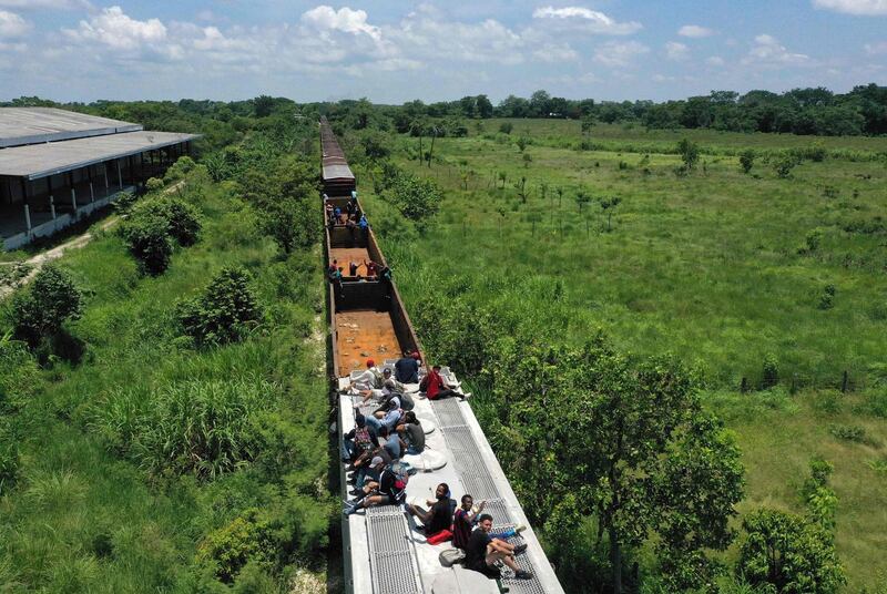 Aerial view of migrants on a train known as "The Beast" in Palenque, Chiapas state, Mexico.  AFP