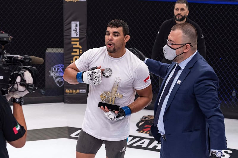 Brazilian Juscelino Ferreira is congratulated by Palms Sports general manager Fouad Darwish after his victory over Tarek Suleiman in the 90kg Catchweight. Courtesy UAE Warriors