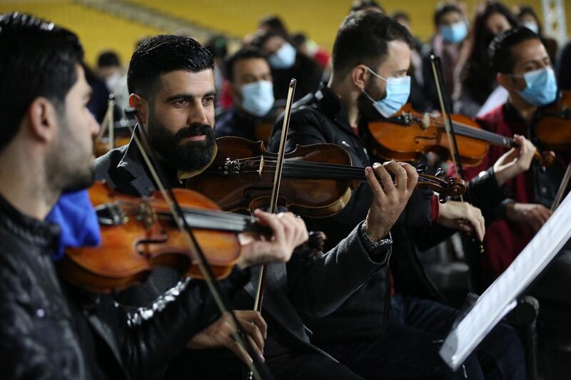 Musicians from a joint Kurdish and Christians orchestra and choir rehearse at Erbil international Stadium, also known as the Franso Hariri Stadium, for the visit of Pope Francis to the capital of the Kurdistan region in Iraq. EPA
