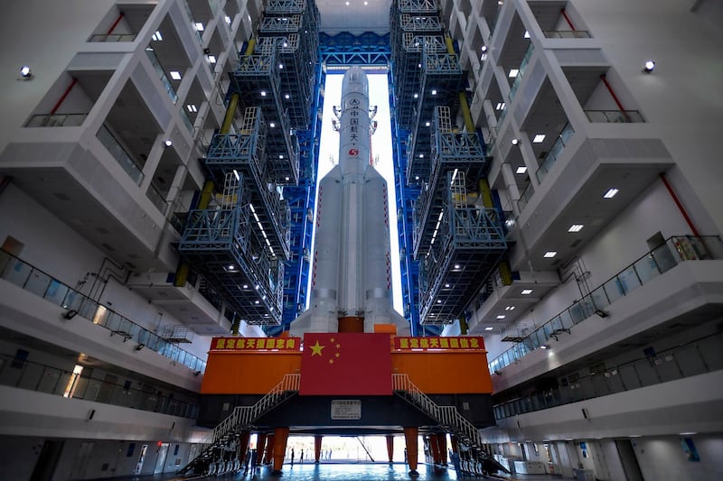 This photo taken on July 17, 2020 shows a Long March 5 rocket being transferred before a planned launch in Wenchang in China's southern Hainan province. AFP