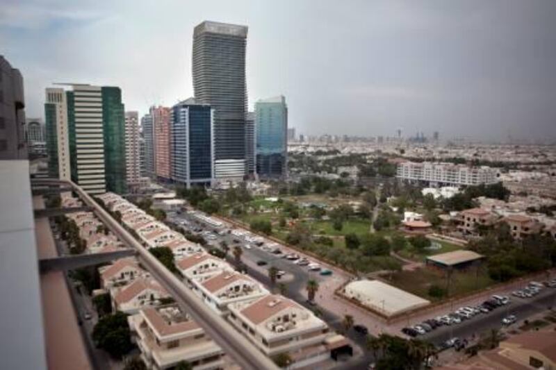 Overlooking the Khalidiya neighborhood, Seba Tower rises 47 stories tall as seen on July 24, 2011, near the Corniche in Abu Dhabi. The nearly finished building comprises of 3 underground levels for parking, another 5 levels of parking above ground, 13 floors of offices and 316 apartments of residential floors consisting of one, two and three-bedroom flats on each floor, and a dedicated penthouse floor.(Silvia Razgova/The National)

