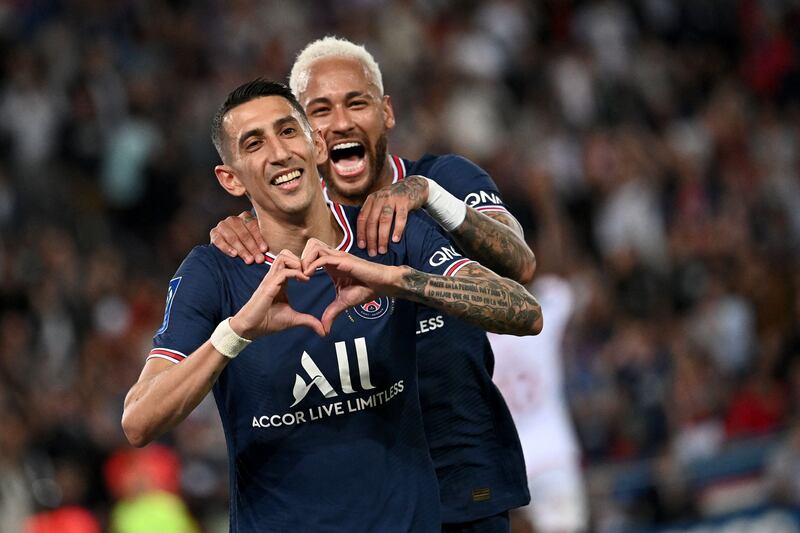 Angel Di Maria celebrates with Neymar after his goal. AFP