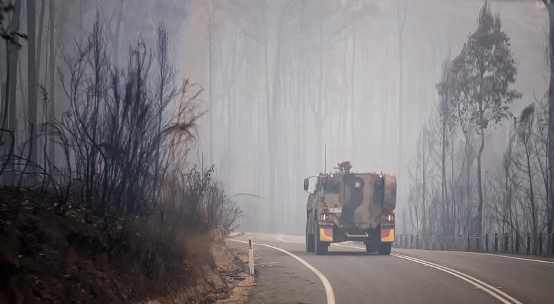 An ADF armoured vehicle personnel carrier is seen on the prince Highway near Mallacoota. Getty Images