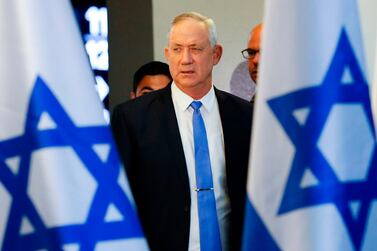 Israel's Blue and White political alliance leader, retired General Benny Gantz, arrives to give a statement ahead of a midnight deadline in the coastal city of Tel Aviv. AFP 