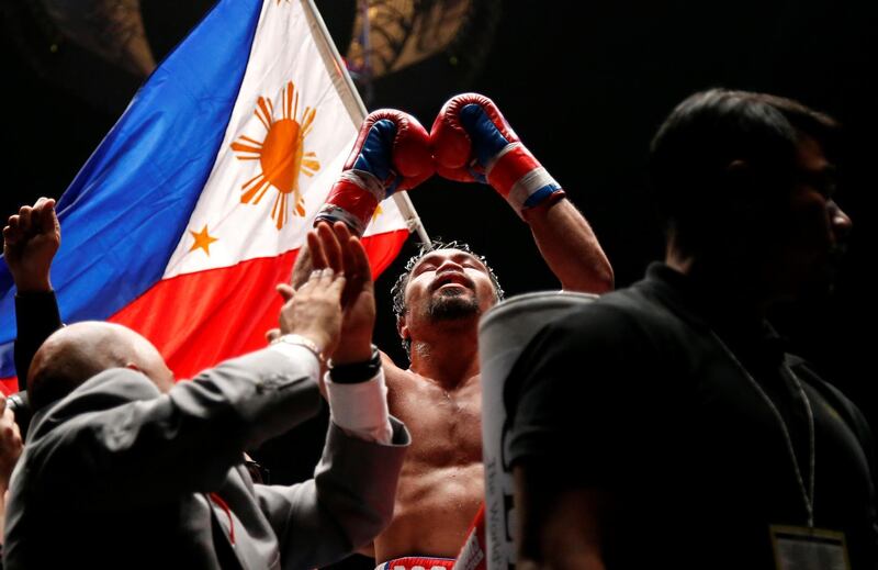 Boxing - WBA Welterweight Title Fight - Manny Pacquiao v Lucas Matthysse - Axiata Arena, Kuala Lumpur, Malaysia - July 15, 2018   Manny Pacquiao celebrates after defeating Lucas Matthysse  REUTERS/Lai Seng Sin