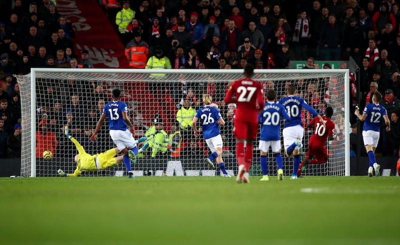 LIVERPOOL, ENGLAND - DECEMBER 04: Sadio Mane of Liverpool scores his teams 4th goal during the Premier League match between Liverpool FC and Everton FC at Anfield on December 04, 2019 in Liverpool, United Kingdom. (Photo by Clive Brunskill/Getty Images)