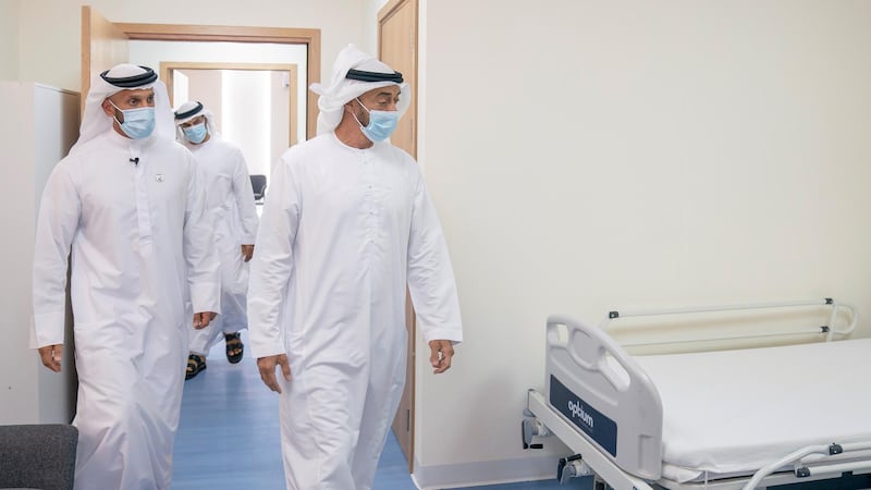 ABU DHABI, UNITED ARAB EMIRATES - May 18, 2020: HH Sheikh Mohamed bin Zayed Al Nahyan, Crown Prince of Abu Dhabi and Deputy Supreme Commander of the UAE Armed Forces (R) visits Emirates Field Hospital, at Emirates Humanitarian City. Seen with HE Sheikh Abdullah bin Mohammed Al Hamed, Chairman of the Department of Health - Abu Dhabi (L).

( Hamad Al Mansoori for the Ministry of Presidential Affairs )​
---