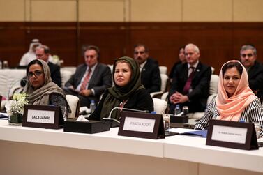 From left to right, Director of Afghan Women Network Mary Akrami, Afghan civil society and women's rights activist Laila Jafari, and Member of the Wolesi Jirga (lower house of the Afghan assembly) Fawzia Koofi attend the Intra Afghan Dialogue talks in the Qatari capital Doha. AFP