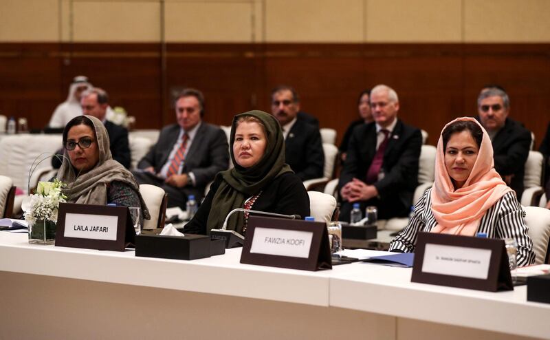 (FILES) In this file photo taken on July 7, 2019, (L-R) Director of Afghan Women Network (AWN) Mary Akrami, Afghan civil society and women's rights activist Laila Jafari, and Member of the Wolesi Jirga (lower house of the Afghan assembly) Fawzia Koofi attend the Intra Afghan Dialogue talks in the Qatari capital Doha. Five Afghan women who endured the Taliban's oppressive rule and fought for fragile gains since the militants were ousted are now preparing to face the hardline group in peace talks. Their presence at the negotiating table is significant in patriarchal Afghanistan, though they will be outnumbered by the rest of the Afghan government's team of 16 men and the Taliban's male-only side.
 / AFP / KARIM JAAFAR / To go with 'AFGHANISTAN-CONFLICT-TALKS-WOMEN' FOCUS by Elise Blanchard
