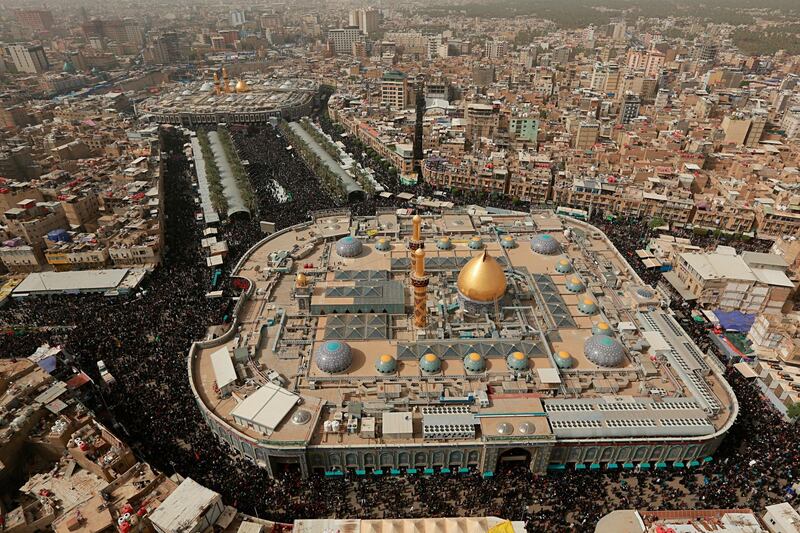 Shiite pilgrims gather between the holy shrines of Imam Hussein and Imam Abbas in Karbala, Iraq. AP Photo