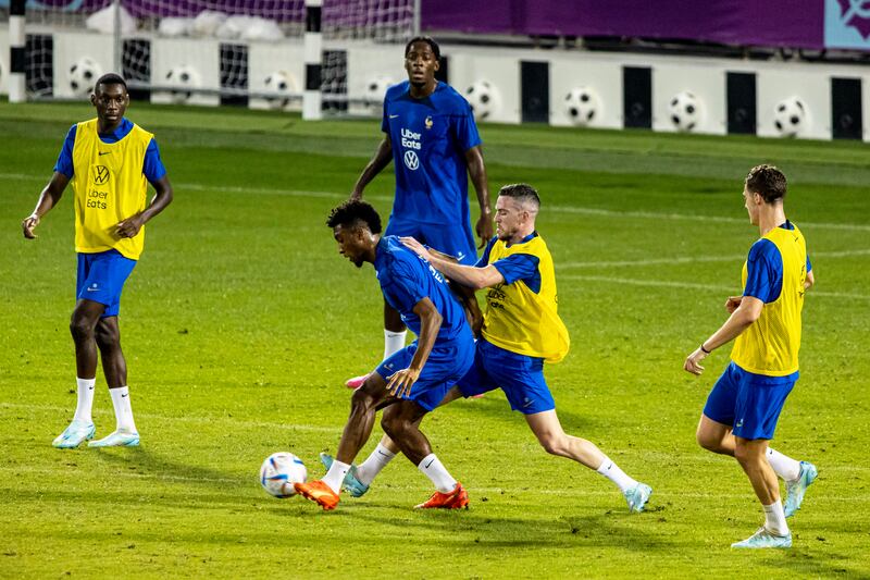 France's Kingsley Coman with teammates during their training session in Doha.  France will face England in the World Cup 2022 quarter-final on Saturday. EPA