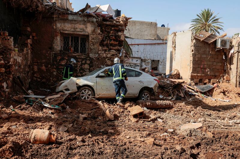 Rescuers search for bodies after the floods in Derna, eastern Libya. More than 880,000 people were directly affected, said the UN. Reuters