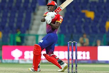 Rovman Powell of Dubai Capitals  plays a shot  during the match 13 of the DP World International League T20 between the MI Emirates and the Dubai Capitals held at the Zayed Cricket Stadium, Abu Dhabi, United Arab Emirates on the 22nd January, 2023. Photo by Vipin Pawar