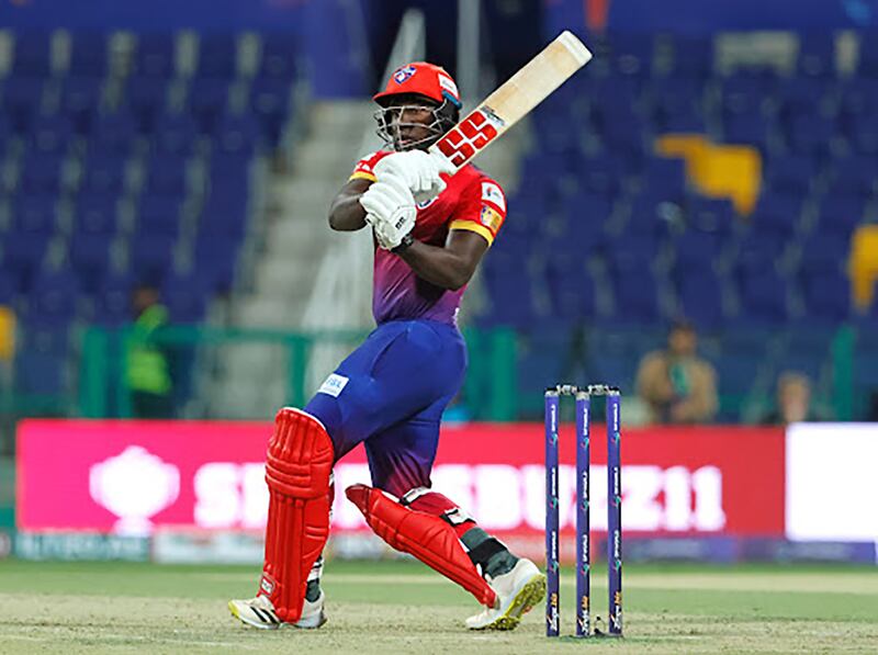 Rovman Powell of Dubai Capitals hits out on his way to a score of 97 off 41 balls in his side's DP World International League T20 victory over MI Emirates at the Zayed Cricket Stadium, Abu Dhabi, on January 22, 2023. Photo by Vipin Pawar