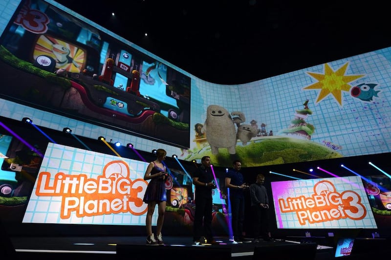 Gamers demonstrate new features and character for the game Little Big Planet 3 at the Sony PlayStation press conference. Michael Nelson / EPA