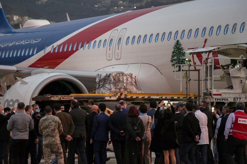 Lebanon's first shipment of the Pfizer-BioNTech Covid-19 vaccines is offloaded at Rafik Hariri International Airport.  EPA