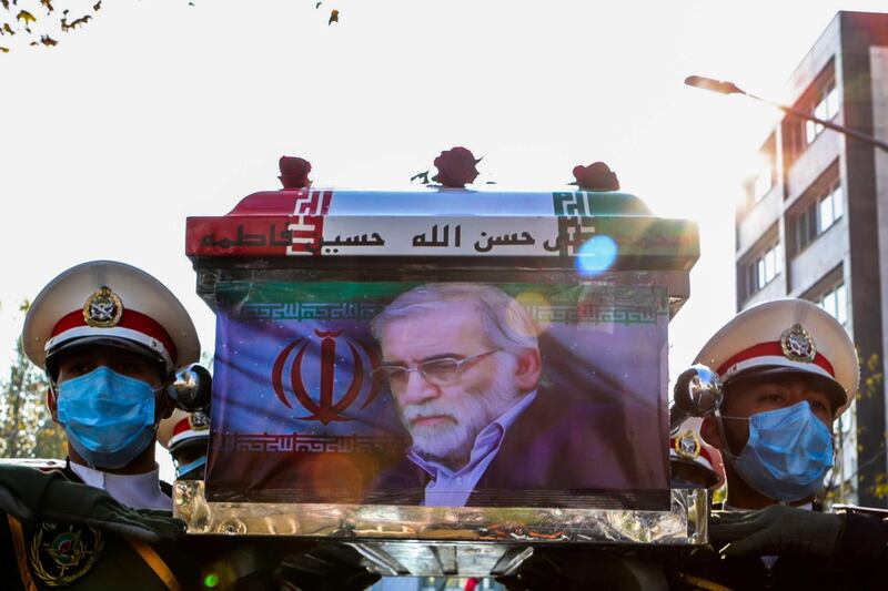 Members of the Iranian forces carry the coffin of Iranian nuclear scientist Mohsen Fakhrizadeh during a funeral ceremony in Tehran, Iran.  REUTERS